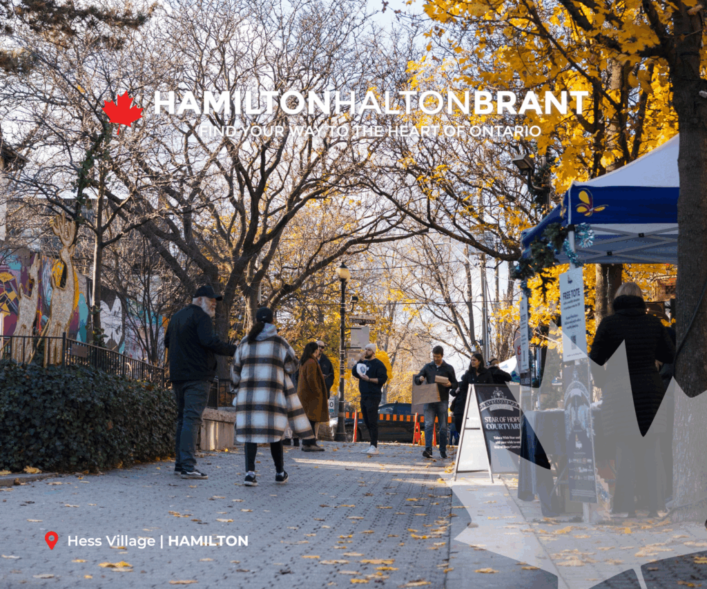 October 2025 E-blast Header showing people walking along Hess Village