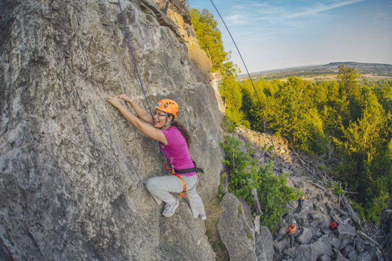 woman rock climbing at Rattlesnake Point Conservation Area